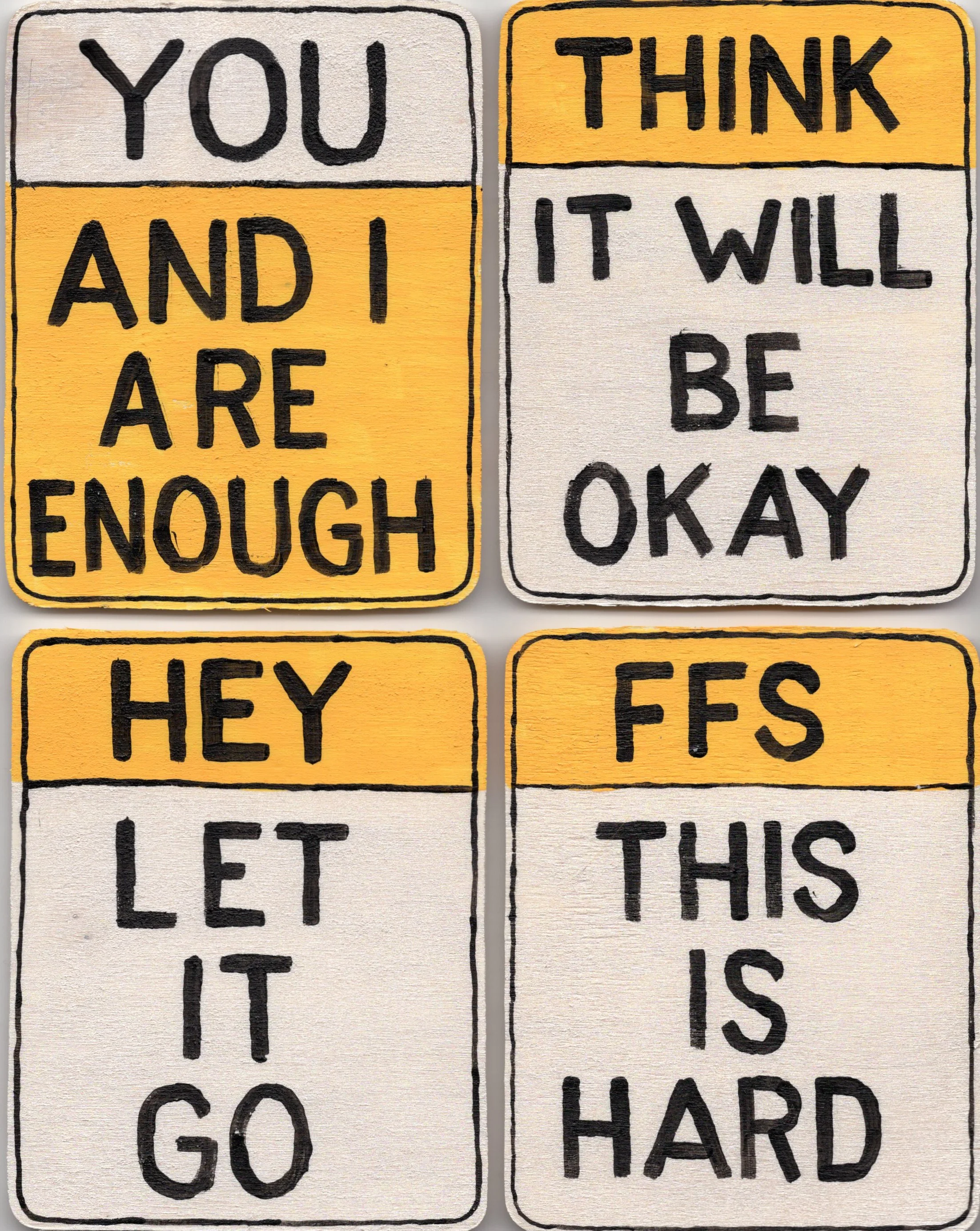 4 small wooden signs.jpg