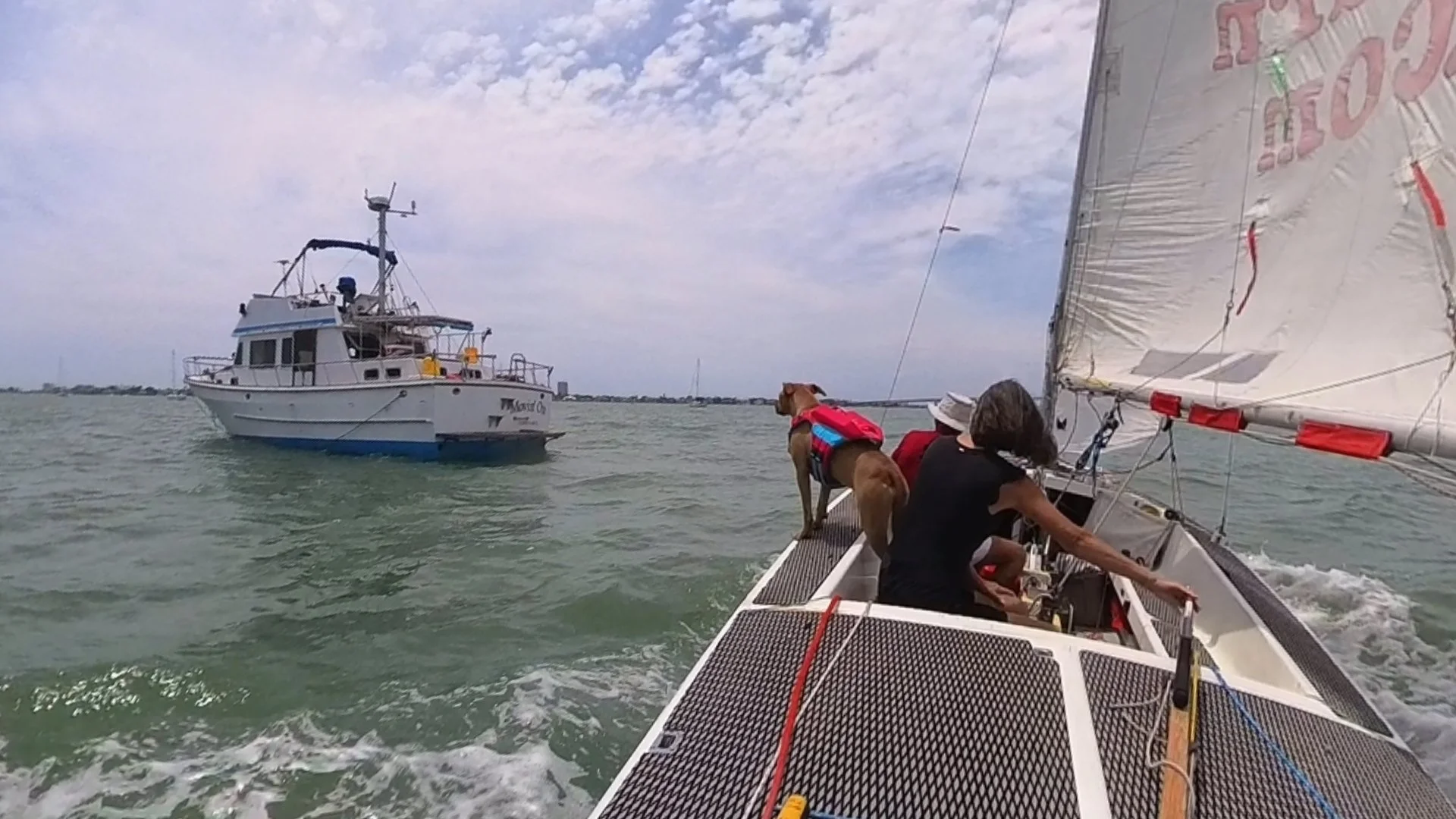 Peggy helming thru the Marina Jacks mooring field