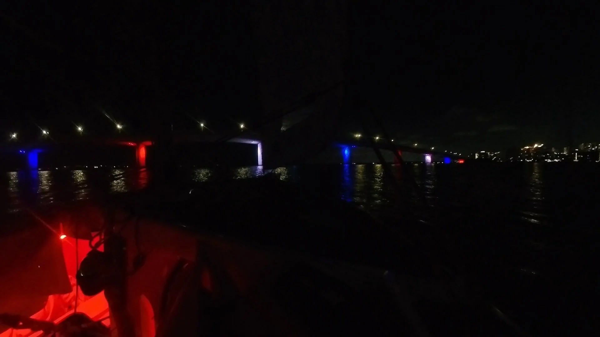 Night sail return back under Ringling Bridge after a trip to Midnight Pass