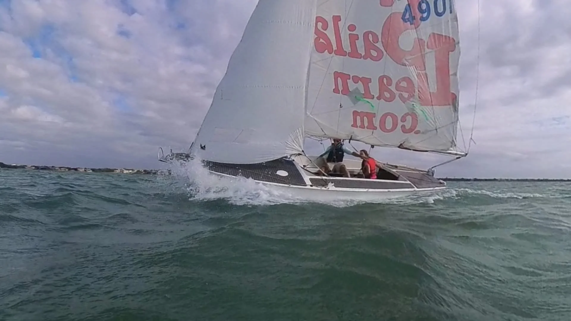 Nicole at the helm - one reef in and still moving fast!