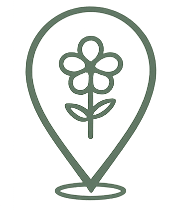 An outline of a location pin with a flower inside