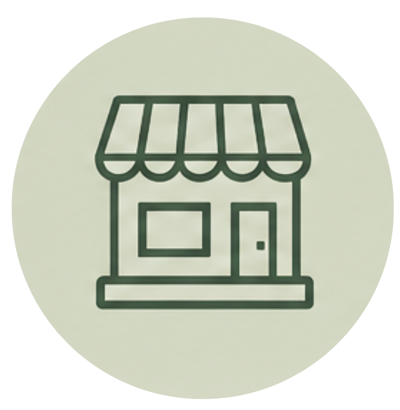 Line drawing of a small storefront with an awning.