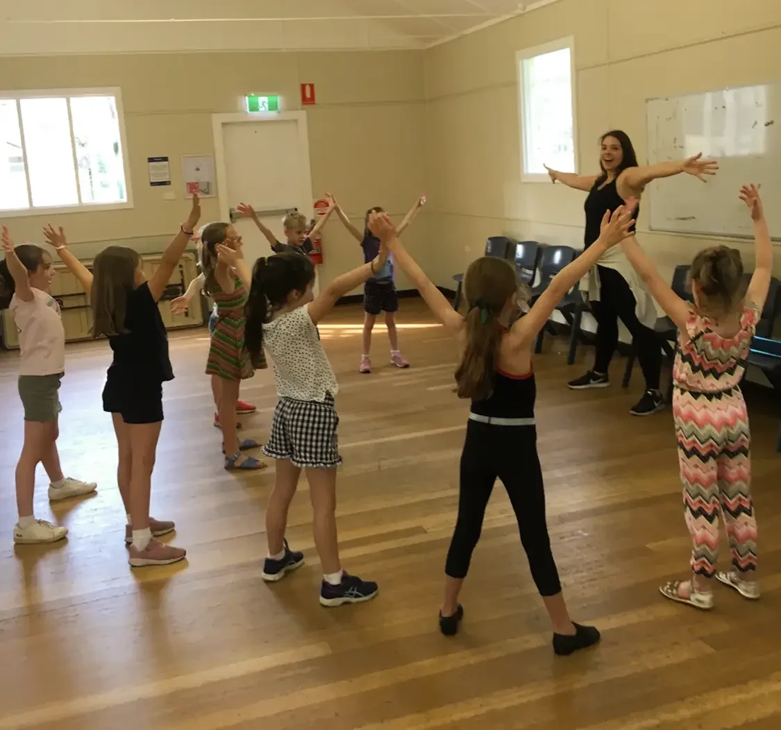 Children participating in a musical theatre and dance class at Boutique Music Theatre