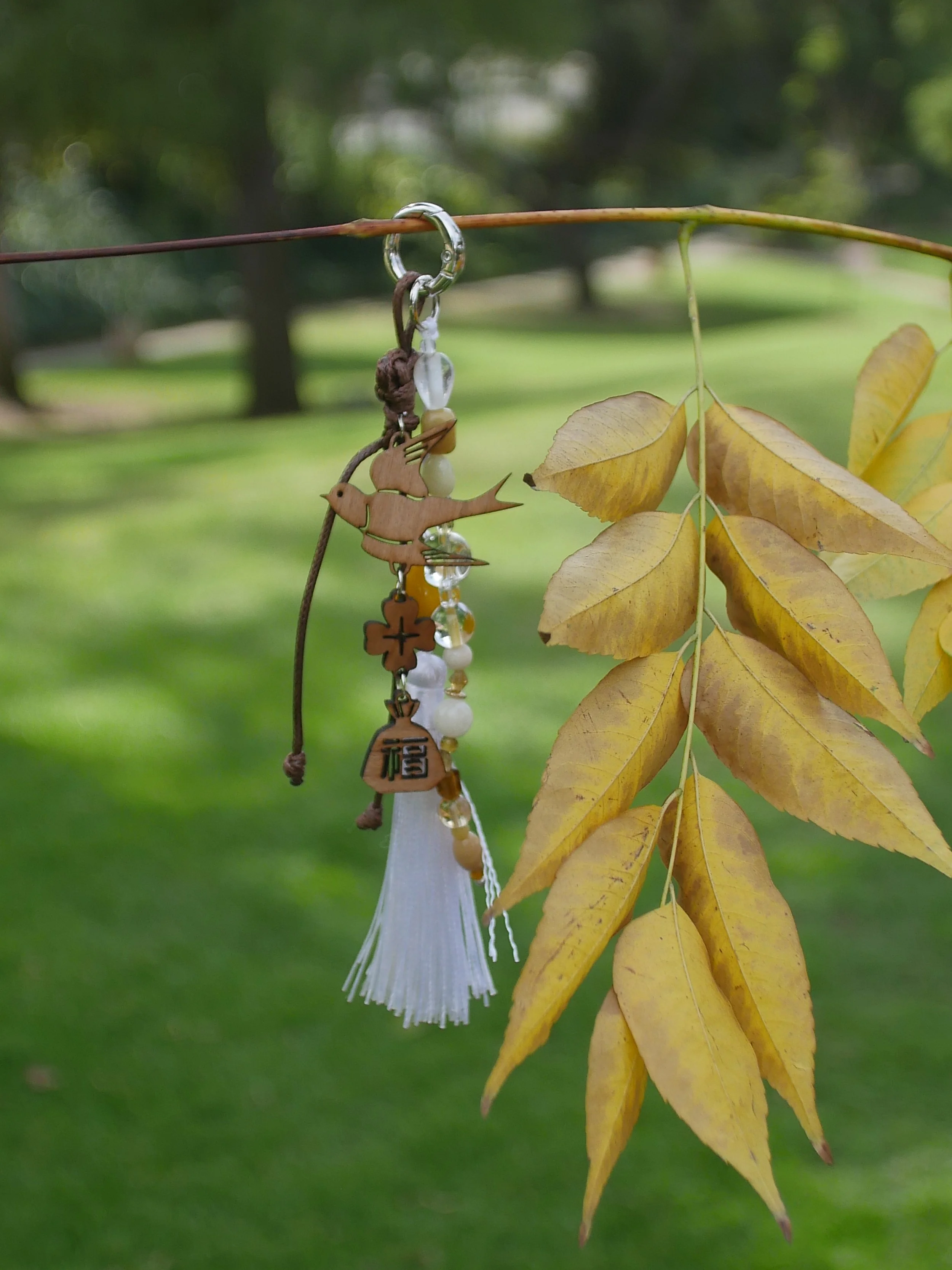 Good Luck Bag Charm with White Tassels
