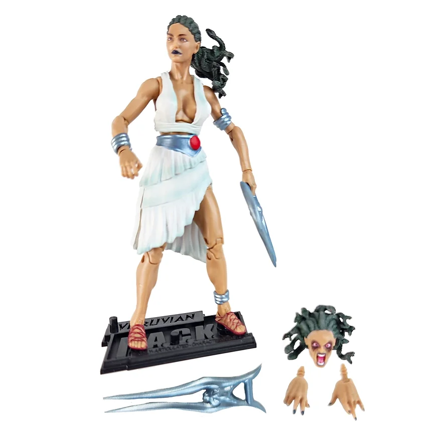 Action figure of ancient warrior woman holding a sword, with a detached head and hands, along with a second sword placed on the ground.