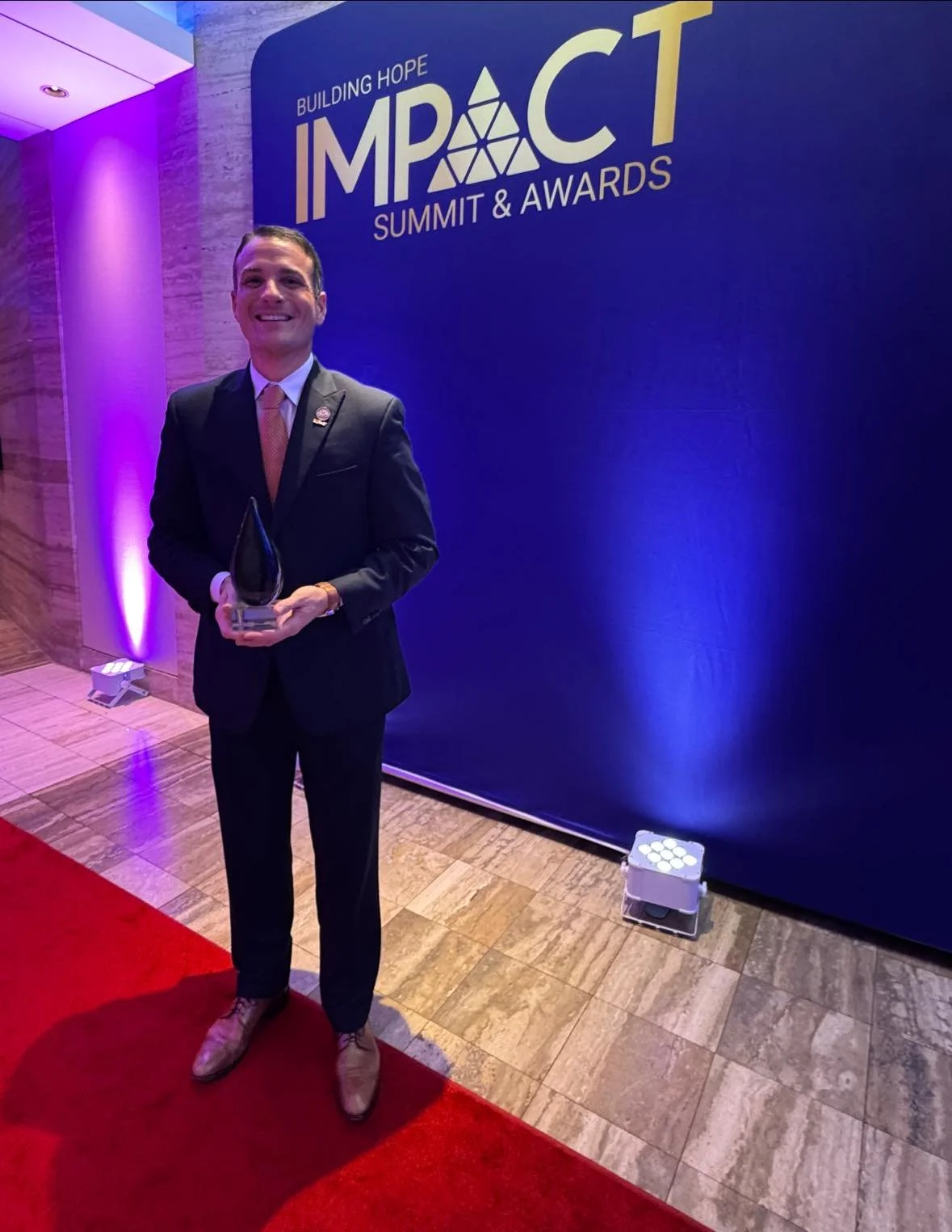 Dr. Trevor Ivey Receives Award at Building Hope IMPACT Summit