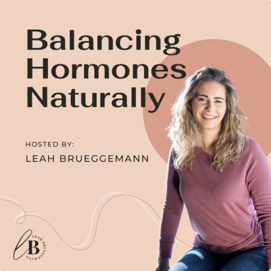 A promotional graphic for a session called 'Balancing Hormones Naturally,' hosted by Leah Brueggemann, featuring a woman with long curly blonde hair wearing a purple long-sleeve top, smiling against a pink and peach background.
