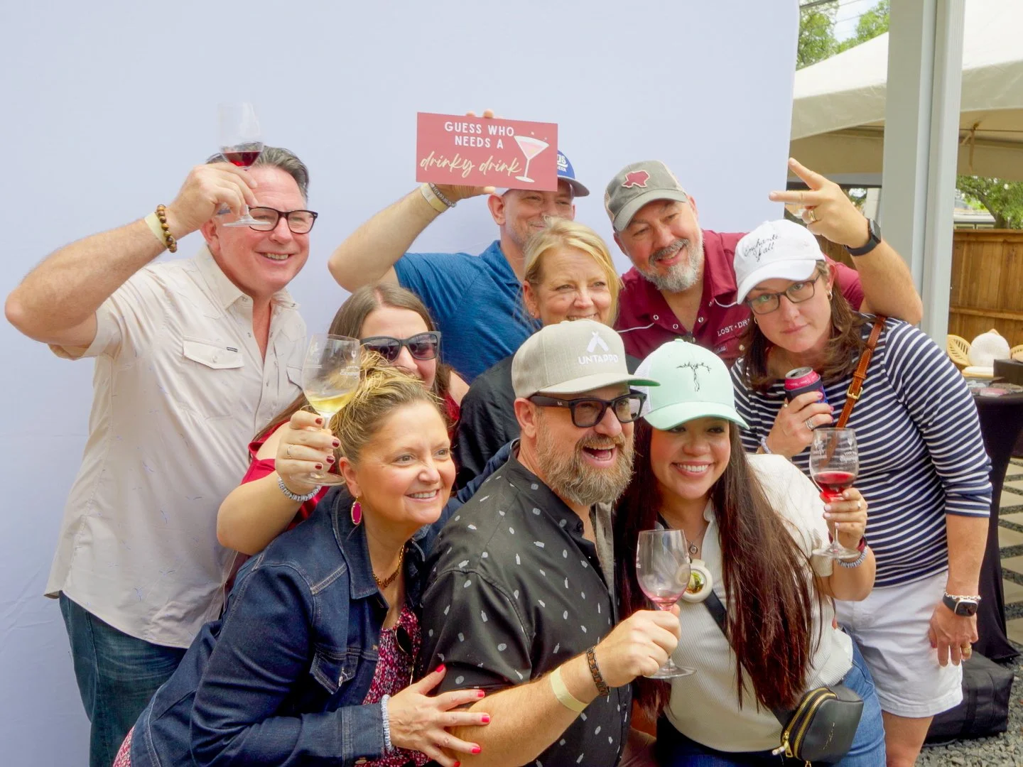 Attendees enjoying a community-focused wine tasting event at Guad Haus, an Austin venue for meetings, workshops, and special events.