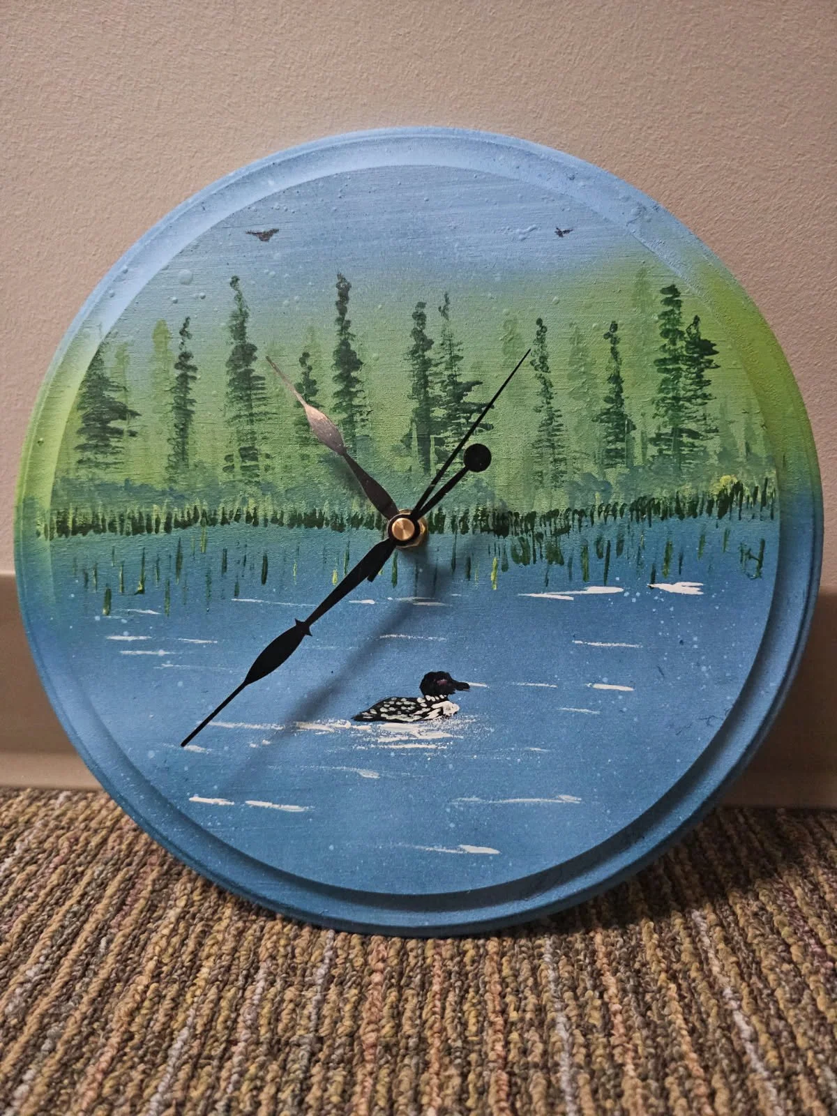 Loon Clock - spray paint art on a wood disk 2025