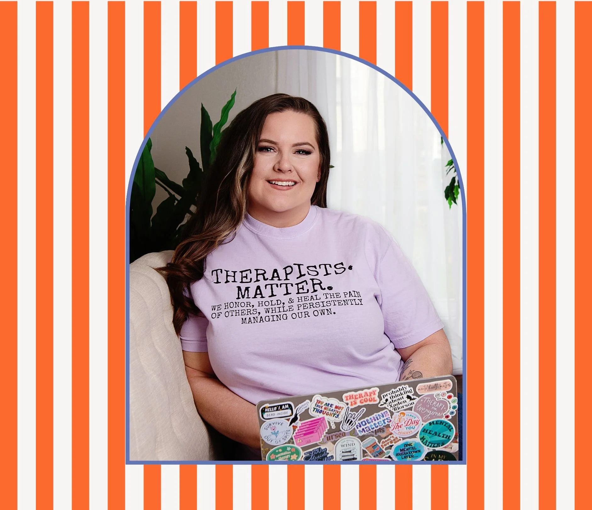 A woman with long brown hair, smiling, wearing a light purple T-shirt that says 'Therapists Matter' and features a quote about honoring and managing pain. She is sitting on a cream-colored couch, with a laptop covered in stickers on her lap, in a room with a window and green plants in the background, framed within an orange and white striped border with a blue outline.