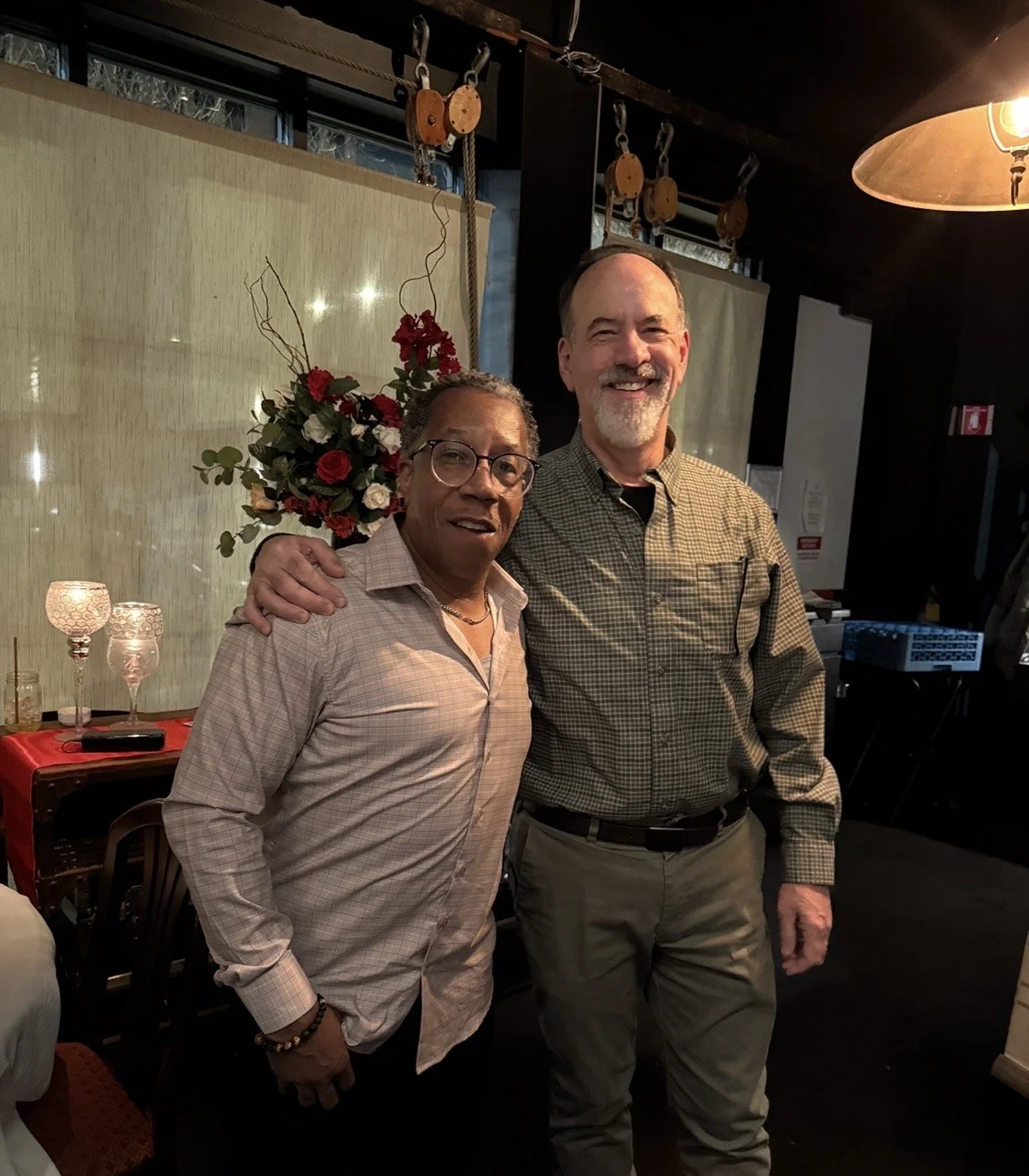 Tim Hutson on the left and Paul Guris on the right, smiling. At South Jazz Club.