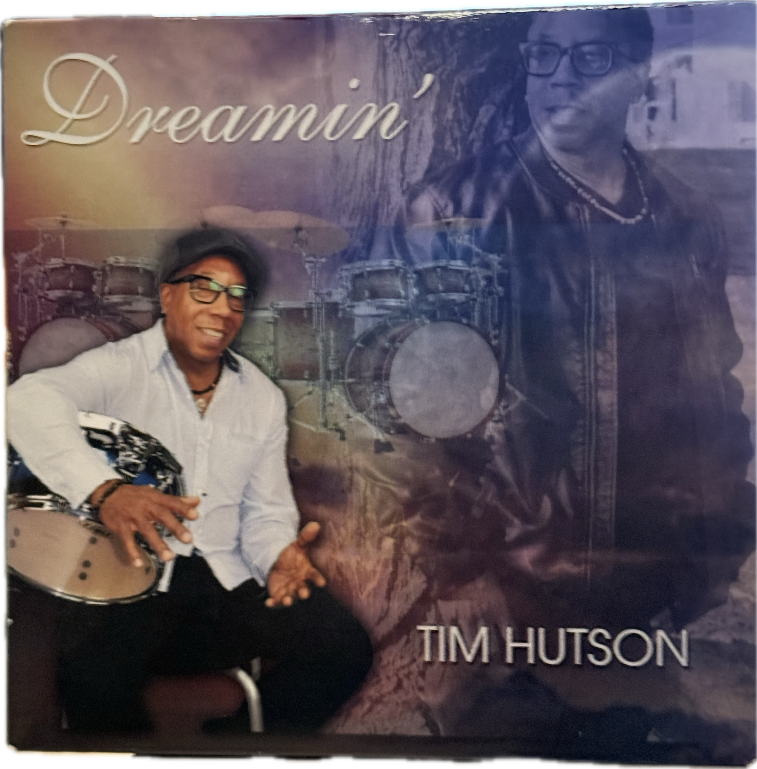 CD cover titled 'Dreamin' by Tim Hutson, featuring a Tim wearing glasses and smiling against a background with drums.