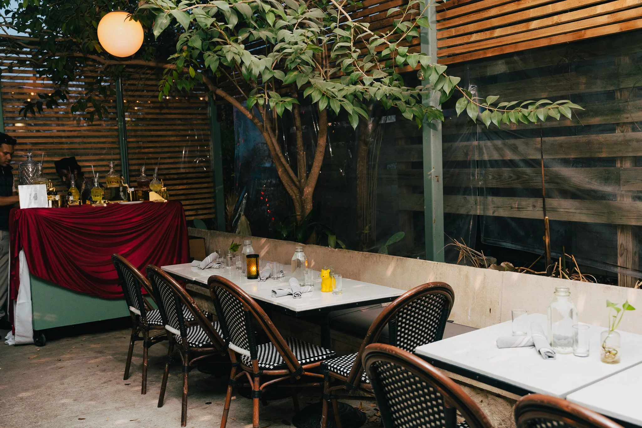 An inviting dinner setting with a garden chic aesthetic
