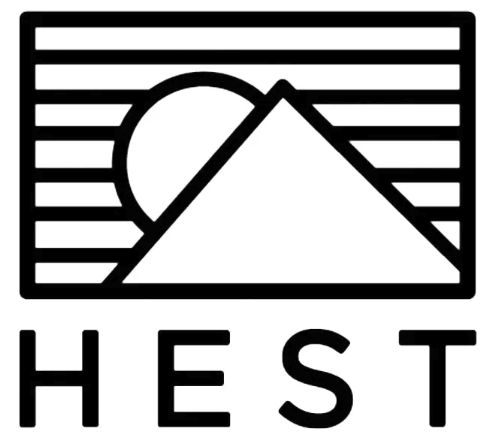 A black and white logo with a stylized sun setting behind a mountain and horizontal lines representing the sky, with the word 'HEST' beneath.