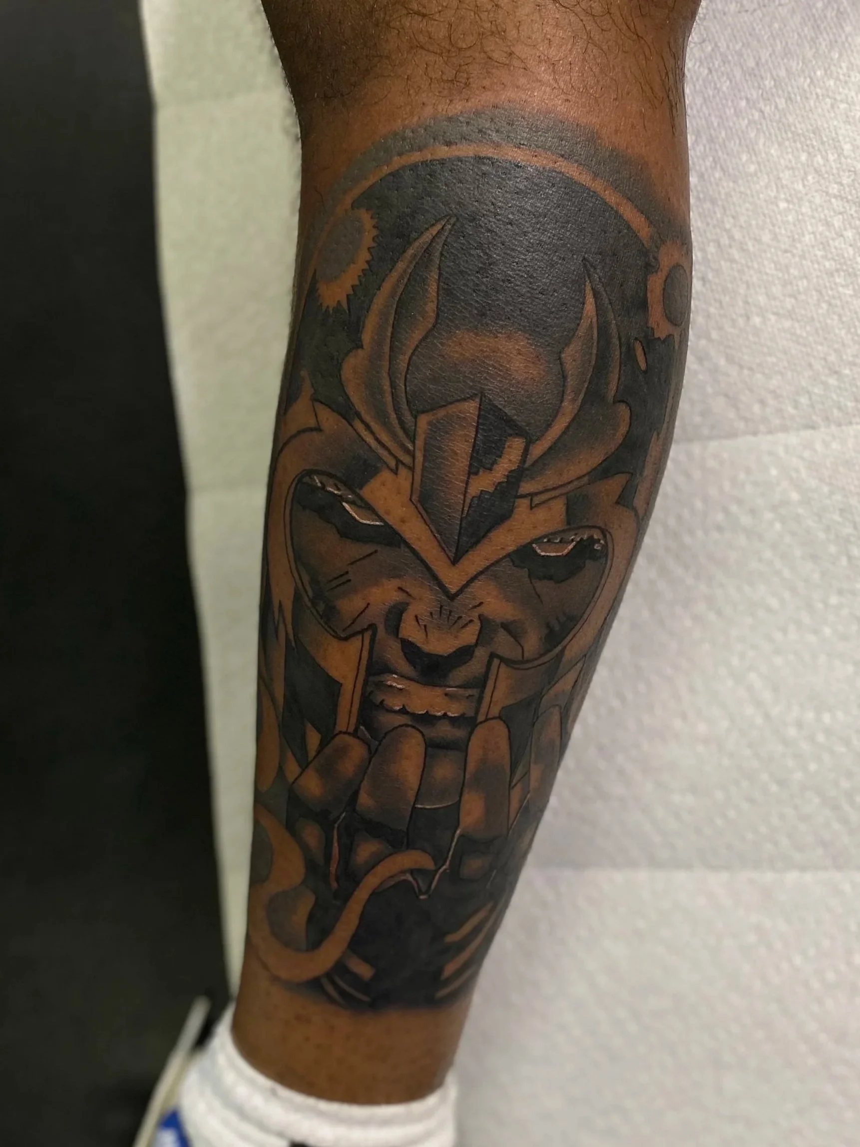 Magneto from X-Men, tattoo on leg