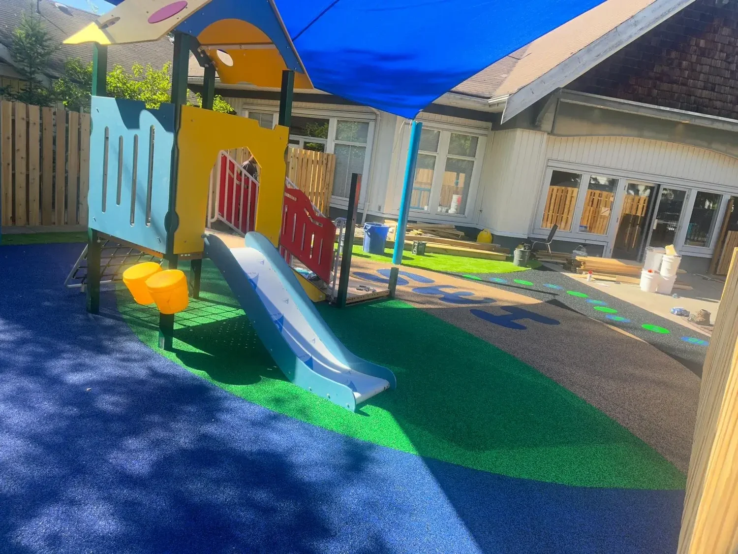 Safe Step Surfacing daycare playground with seamless rubber safety surfacing