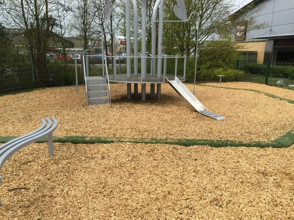 Traditional playground with wood chip surfacing