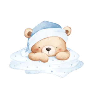 Cute teddy bear wearing a blue sleeping hat, sleeping peacefully on a white pillow.