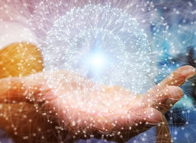 A hand with light effects and digital network graphics representing technology or connectivity.