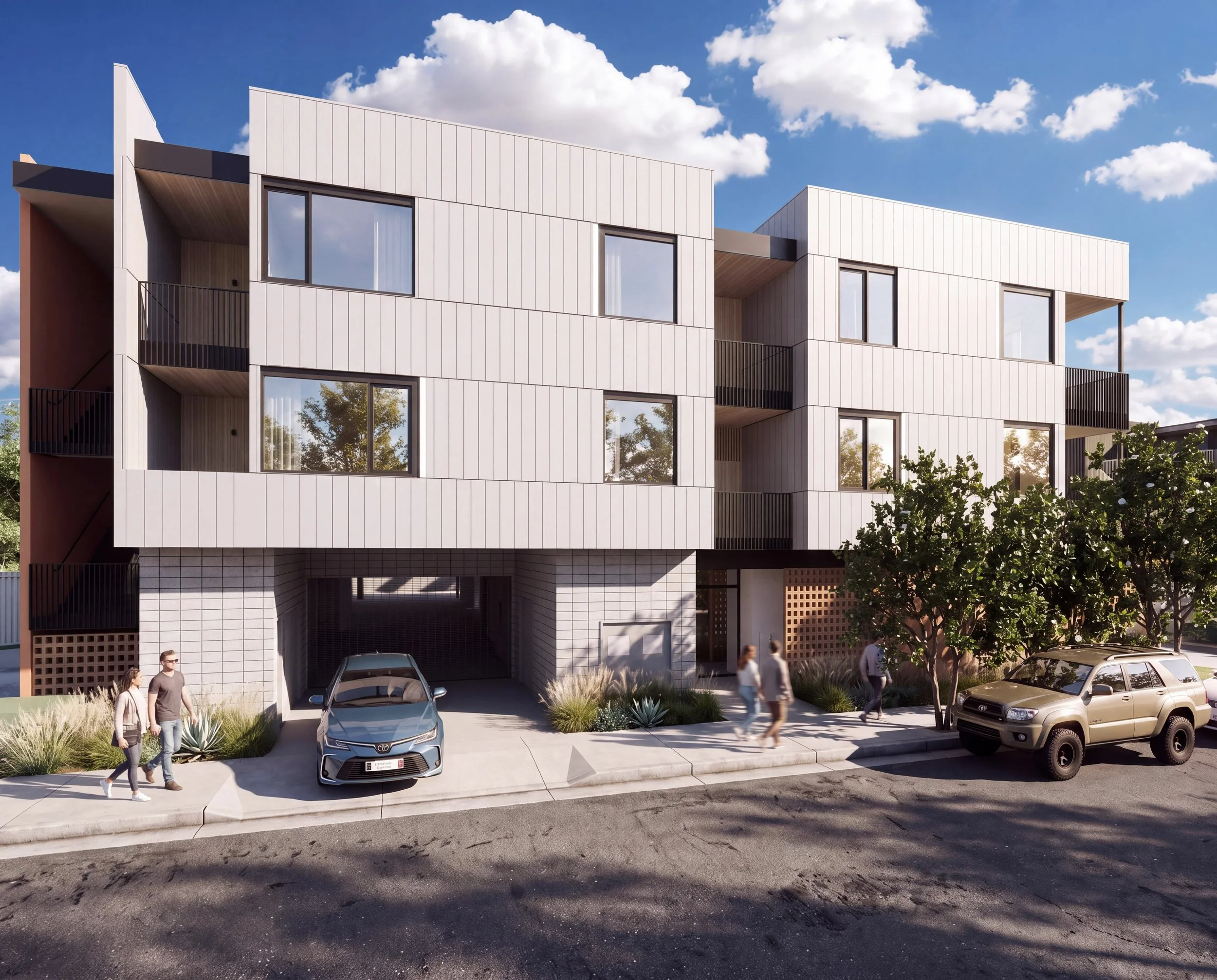 Modern white multi-story apartment building with large windows, small balconies, and parking spaces in front, with a few cars and pedestrians walking nearby under a blue sky with clouds.