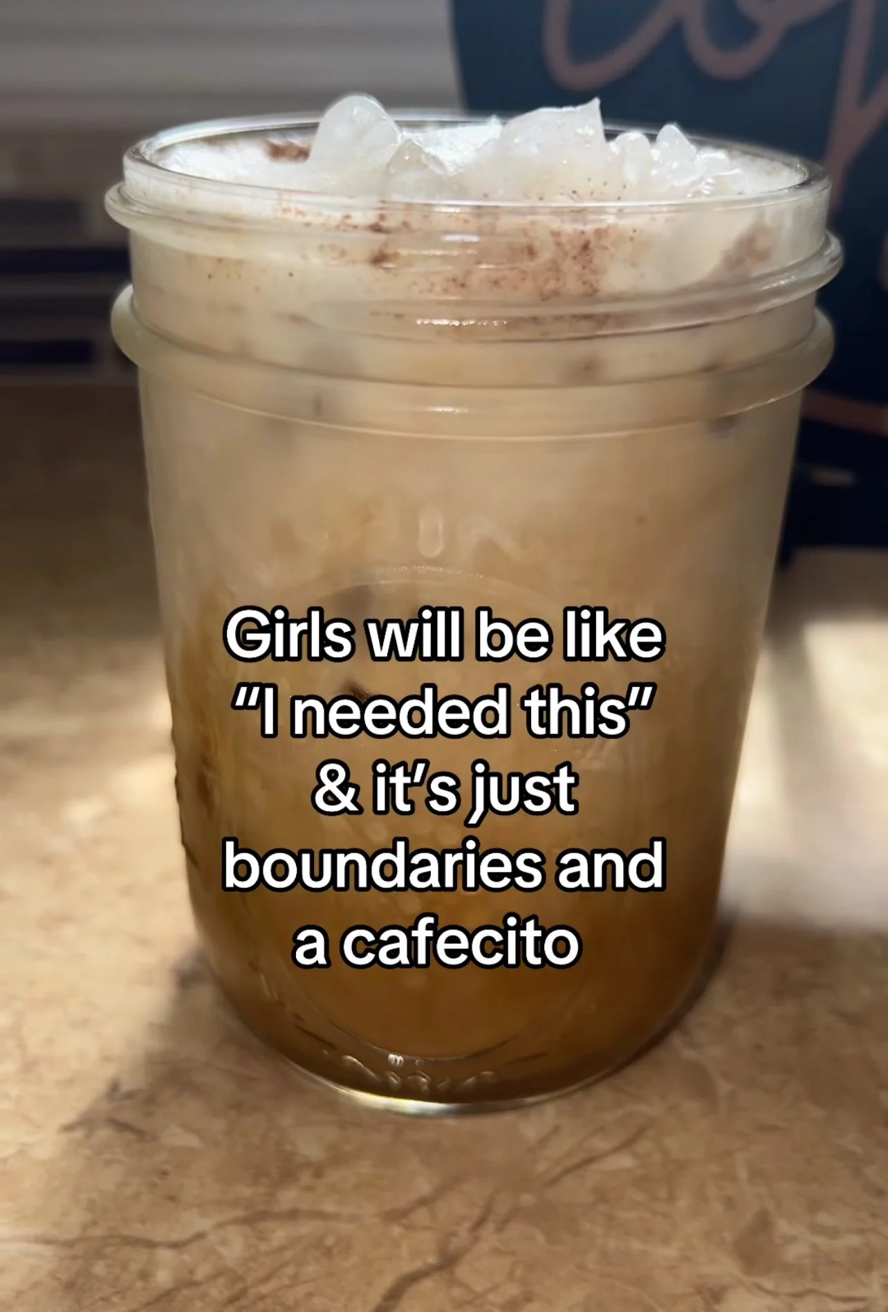 Iced coffee with a quote overlay