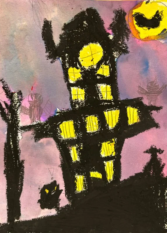 Drawing of a haunted house at night with yellow-lit windows, a dark silhouette of a cat, and a large moon with a spooky face in the sky.