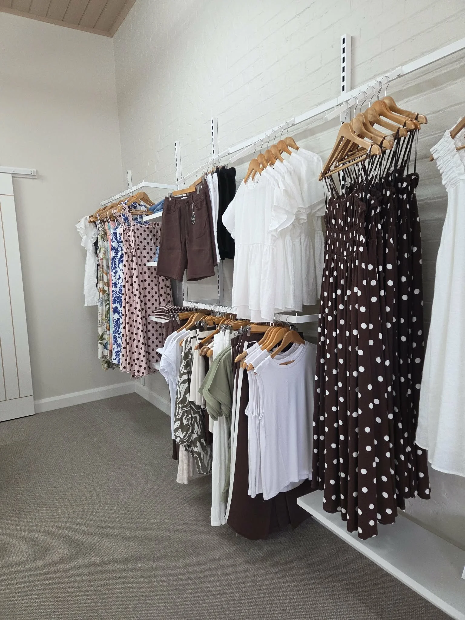 Retail store merchandising with structured rack layout and clear product flow