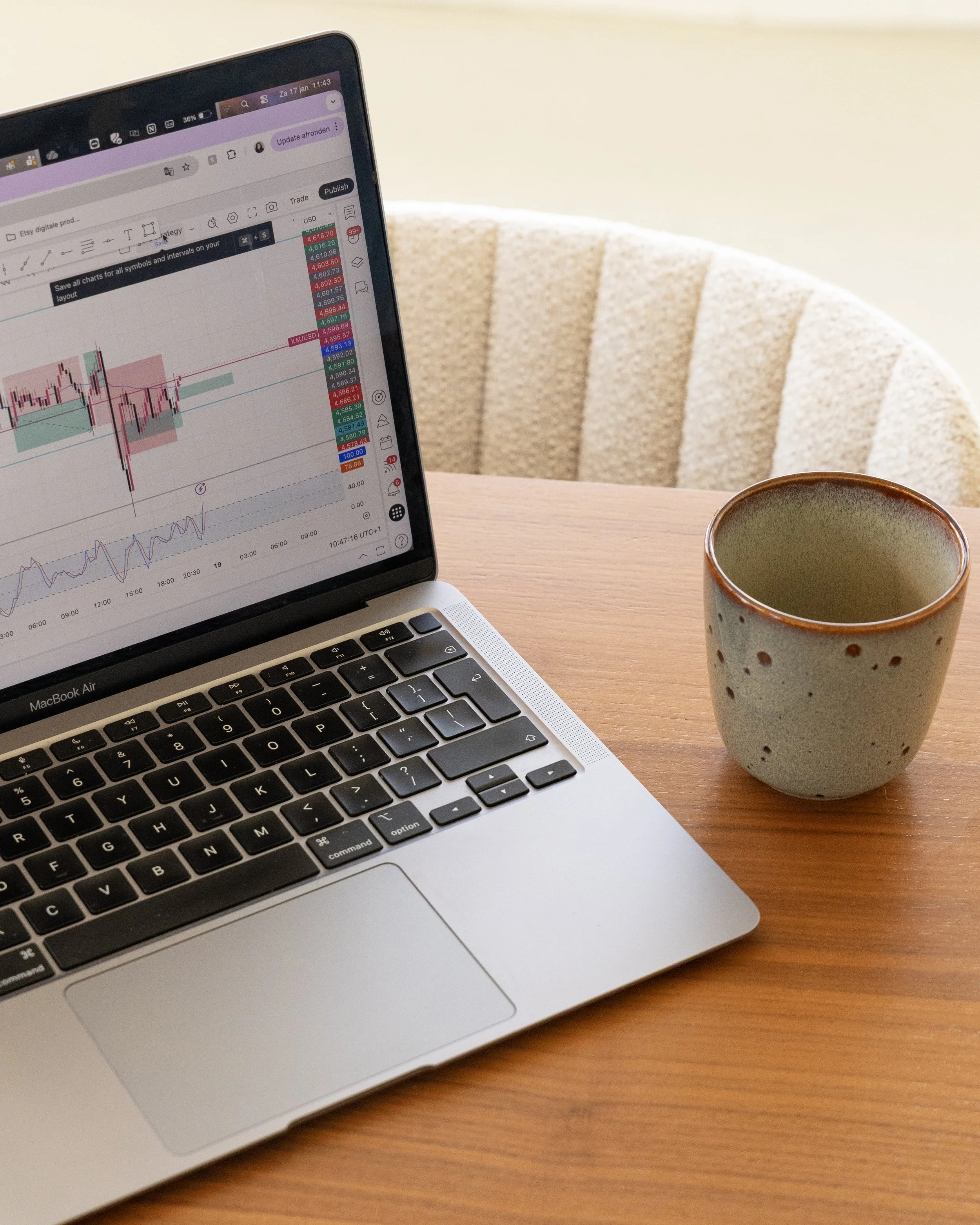 Mountain covered in mist above a grassy hillside with scattered trees.
