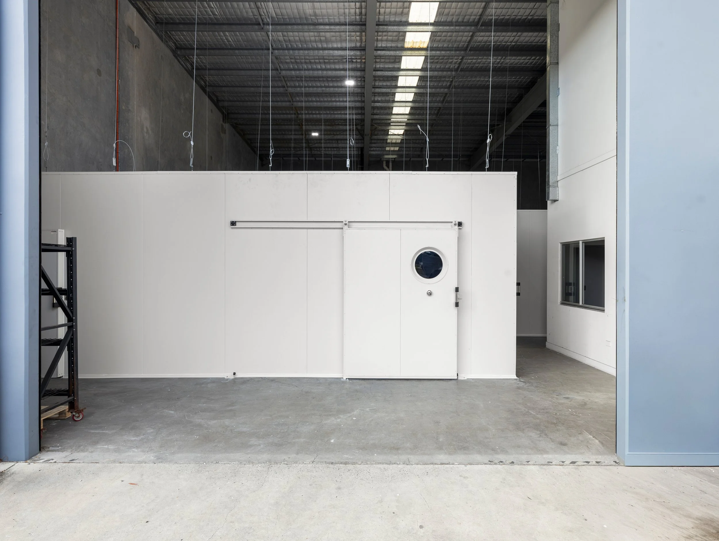 Brisbane City Cold Room Installed by WYPI Building & Service at Brubecks Boutique Foods front facing cold room with doors closed