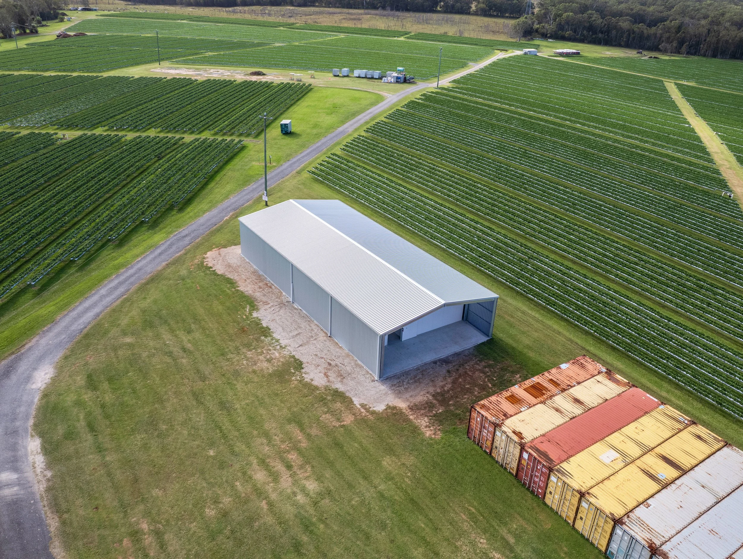 Bellmere, Brisbane Cold Room Installed by WYPI Building & Service at TSL Family Farms drone image showcasing the whole shed & cold room