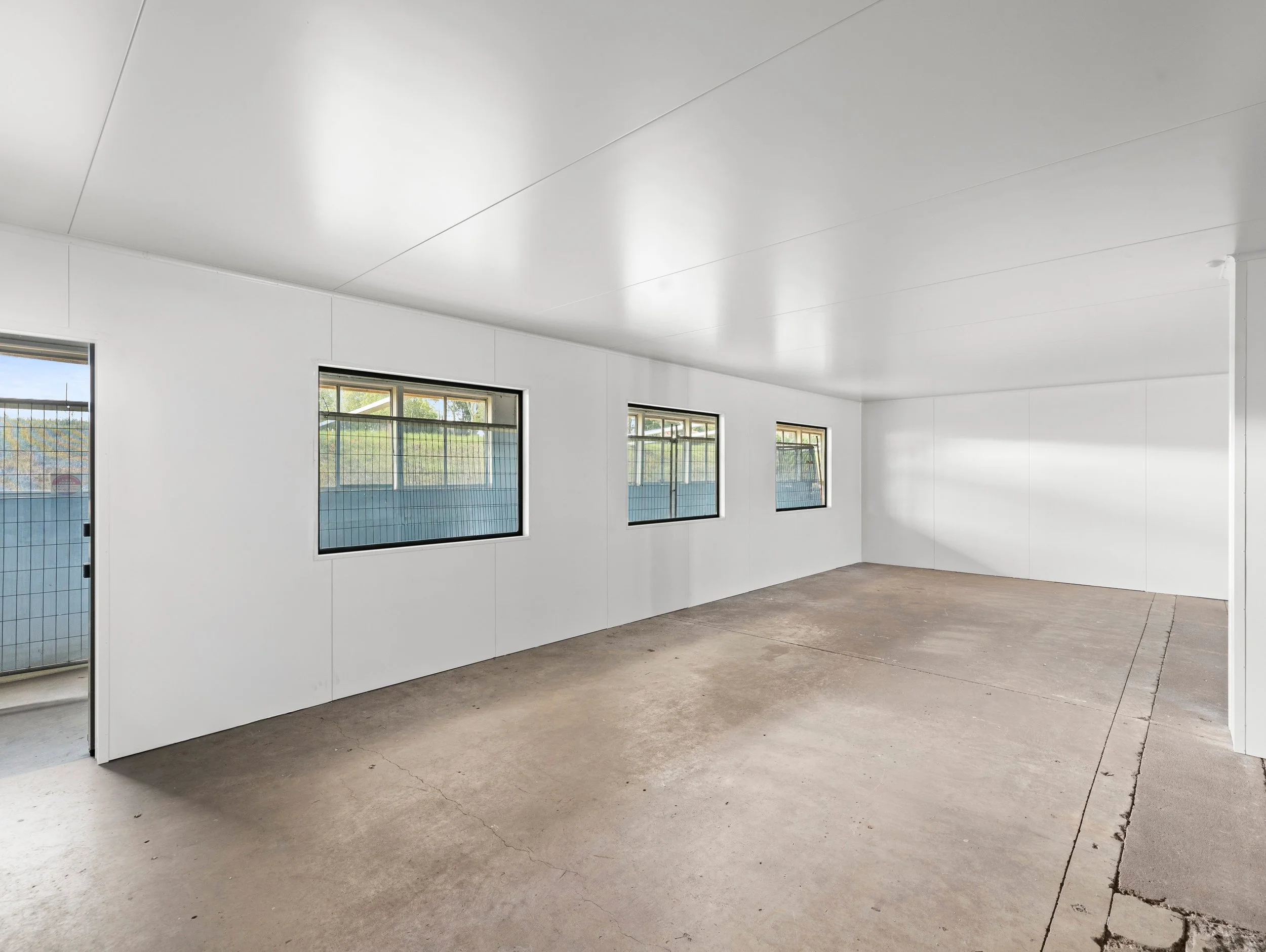 Toowoomba City Cold Room Installed by WYPI Building & Service at Endeavour Foundation Centre rear side off cold room with large windows and back door access