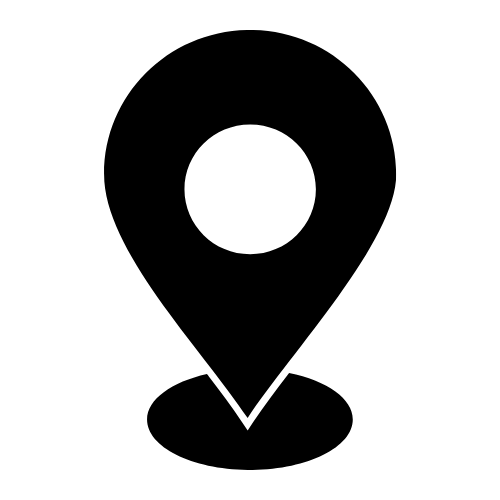 Black location pin icon with a circular hole in the center on a white background.