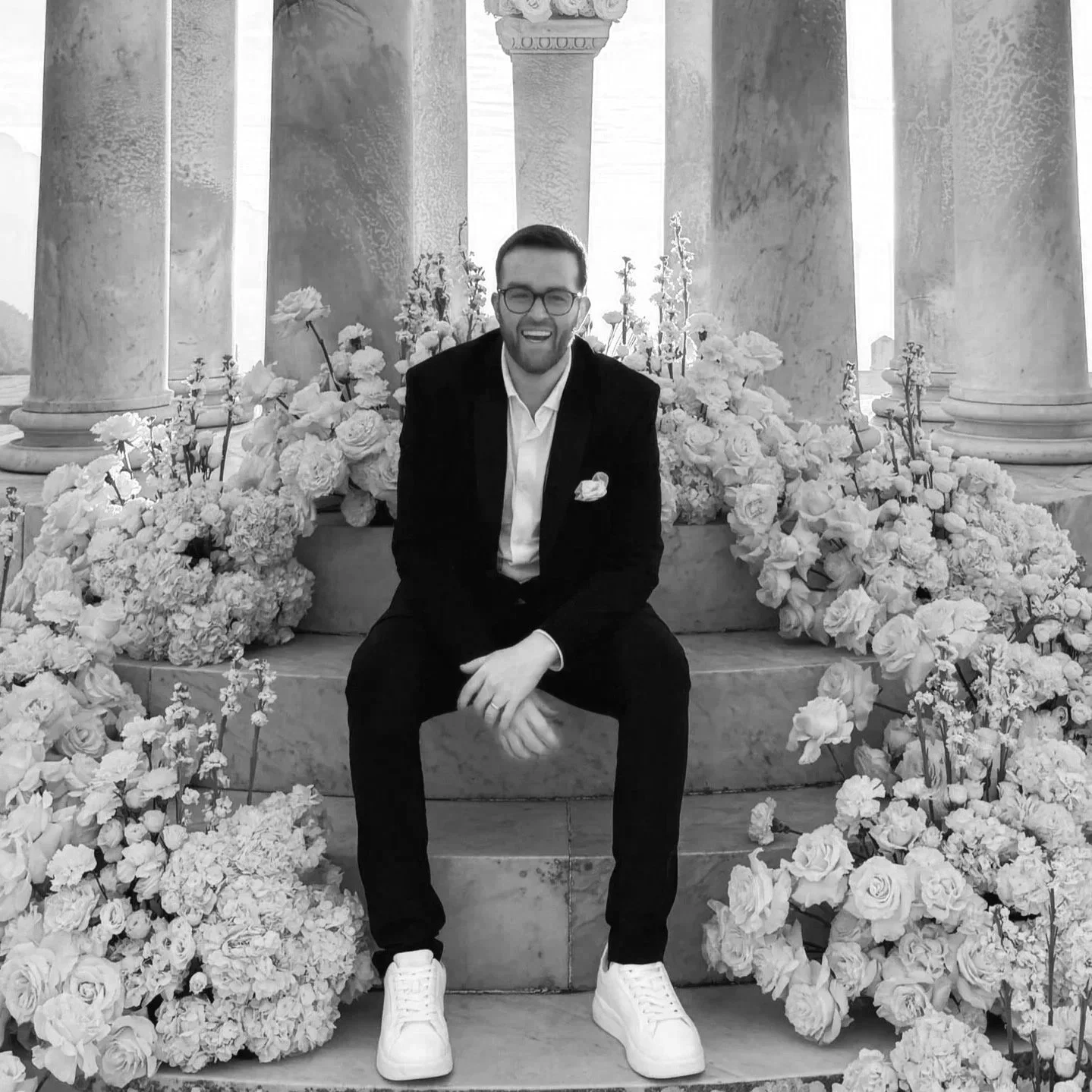 UK Wedding Professionals Forum conference emcee euan lawrence of tartan entertainment on floral dressed steps in Spain