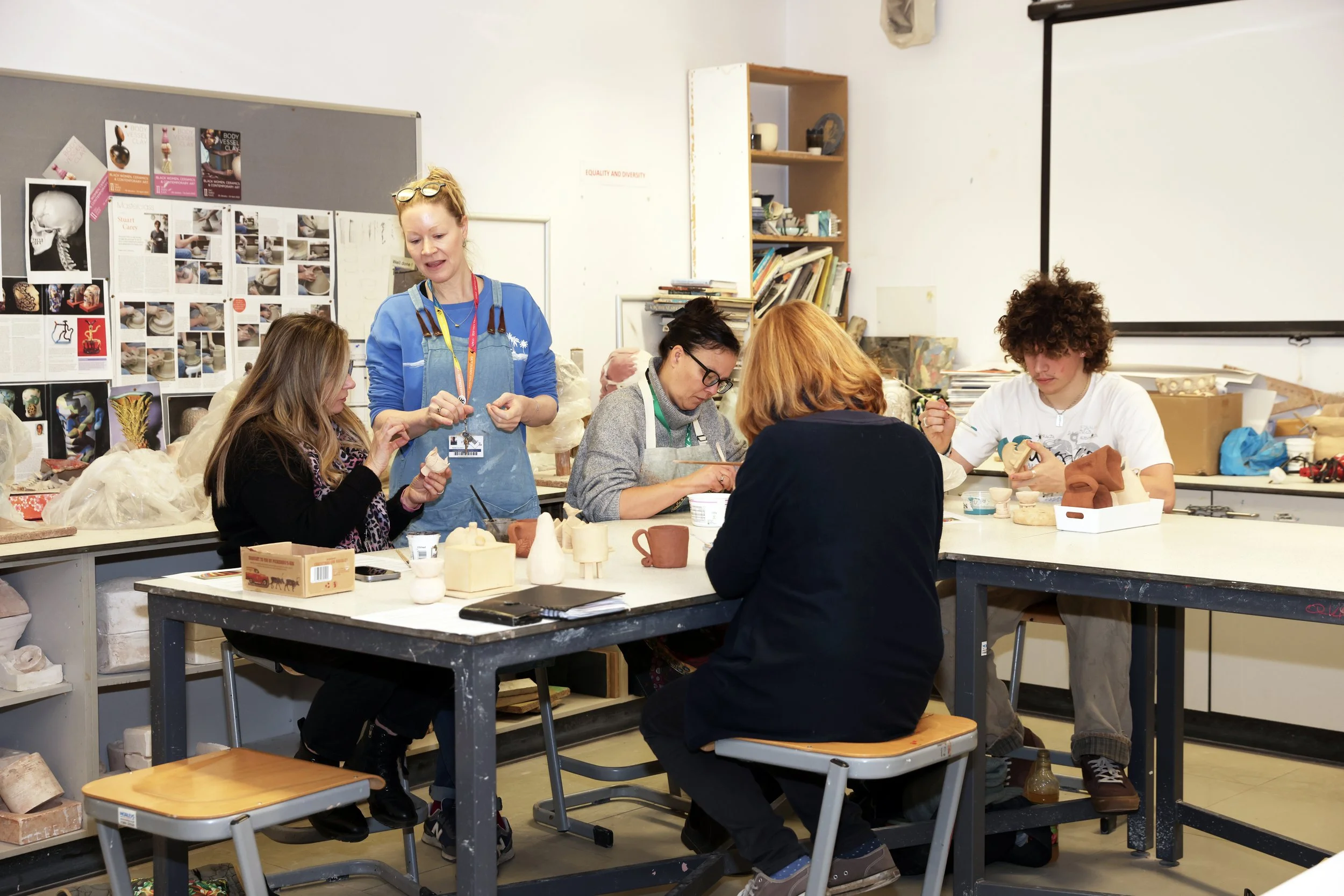 Students exploring various mediums during a Desinger Maker class