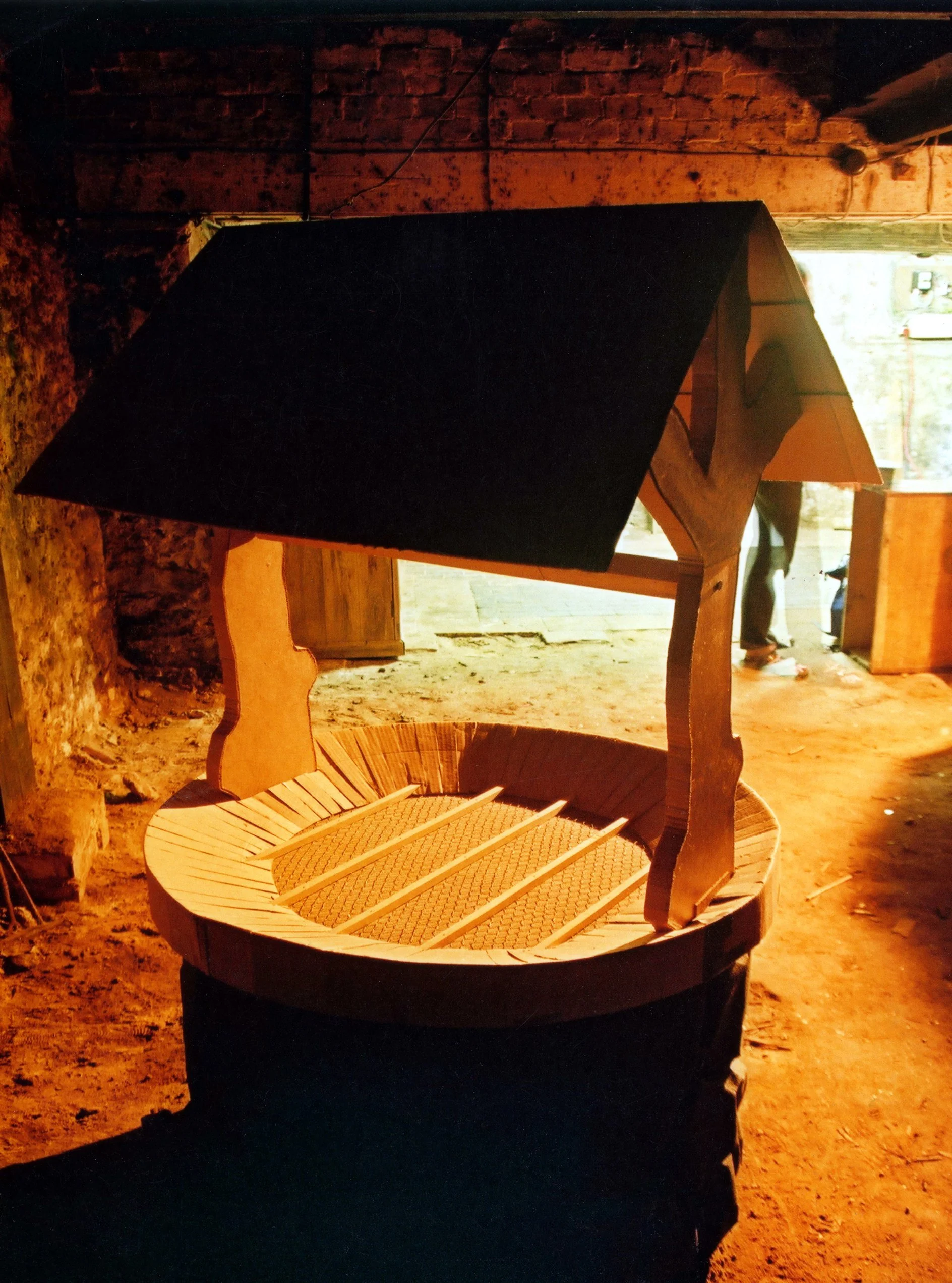 Well, cardboard, wood, wire mesh, roof felt, 200 x 100 x 100cm 