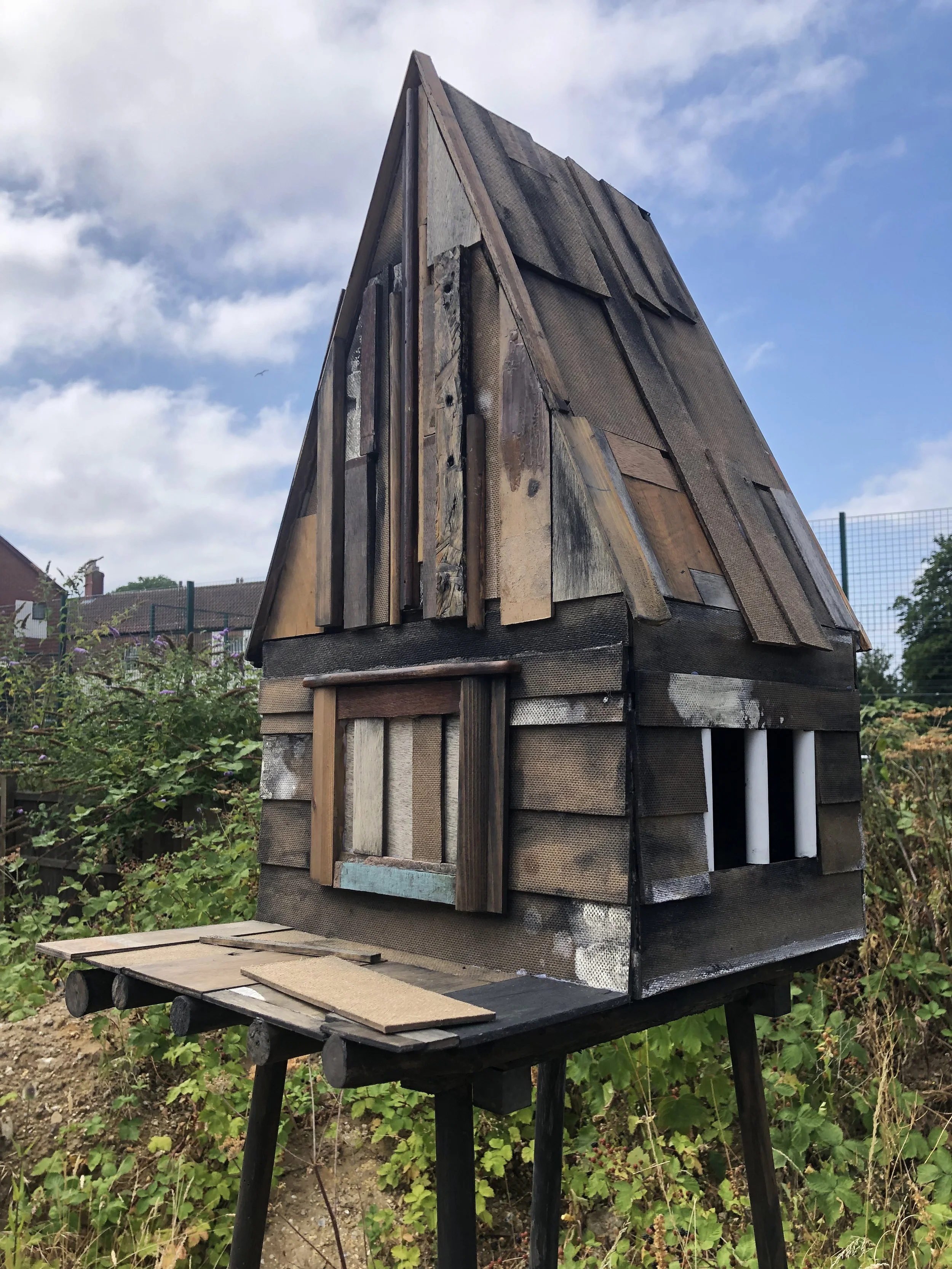  Tower  (from  St. Martin's Land  series), wood, plastic, 260 x 80 x 85cm
