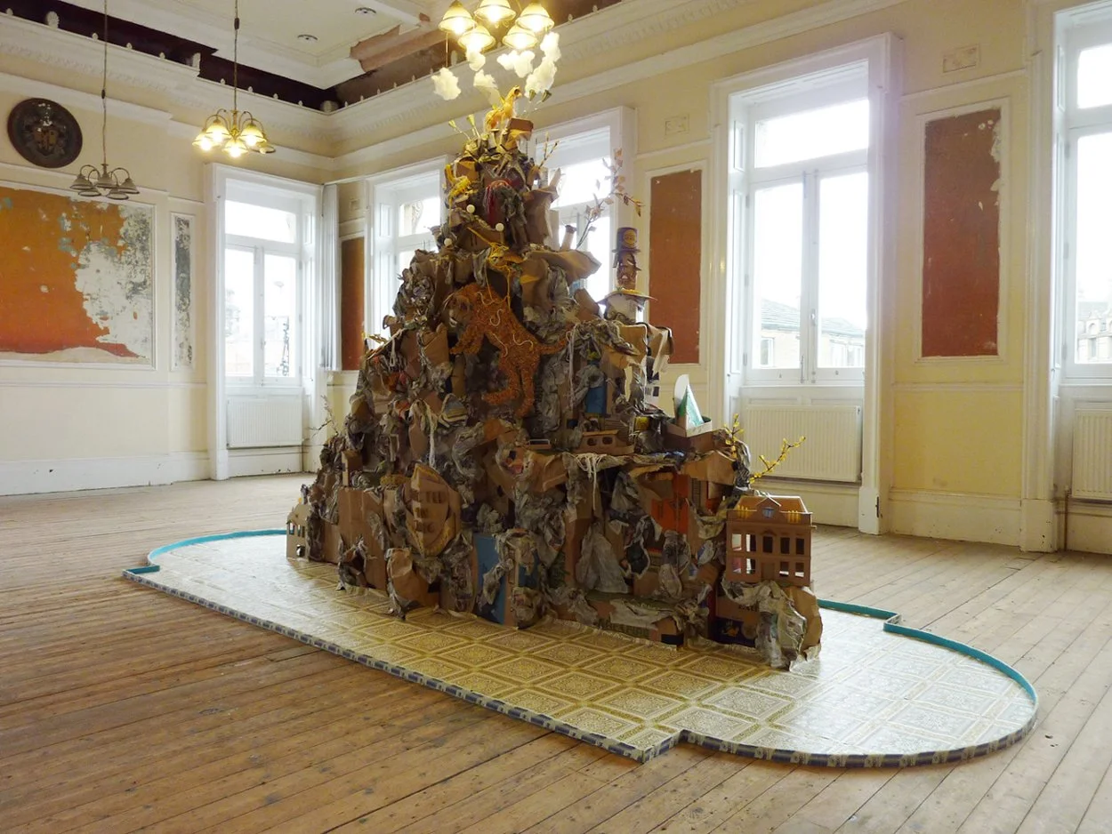 Parnassus III, cardboard, found objects, 300 x 450 x 250cm