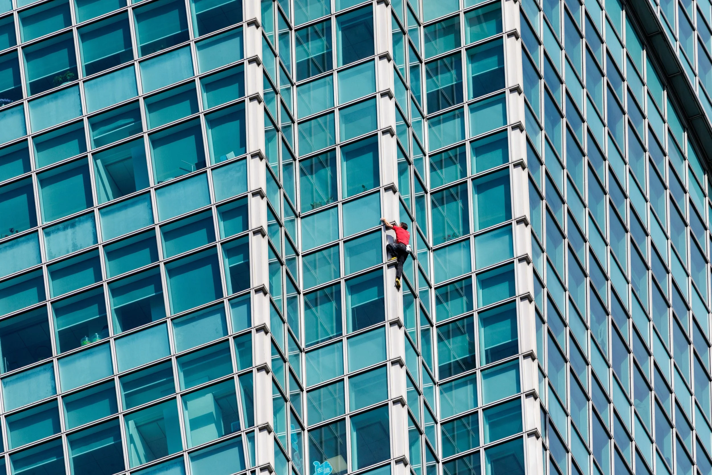 Skyscraper Live — Alex Honnold climbs the exterior of Taipei 101 for Netflix, captured during live global event coverage in Taipei.