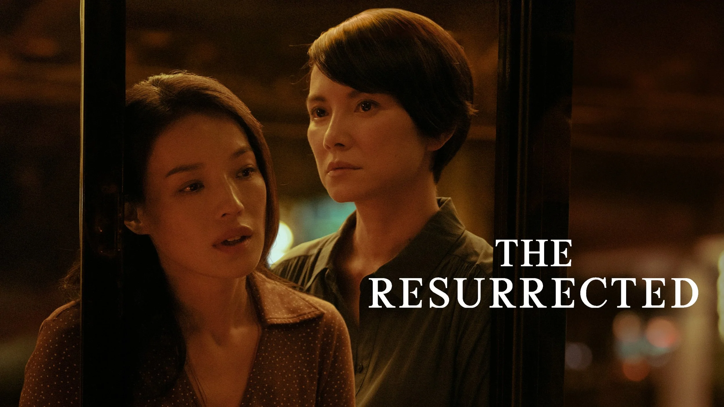 Campaign key visual from The Resurrected, featuring two lead characters in an intimate, suspense-driven moment.