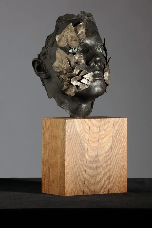   Still  
   SCULPTURE PRIZE WINNER TIE 
 Jas Davidson
 Bronze, patinated and mounted on a wooden block. 
Sculpture Size:	42cm x 23cm x 23cm