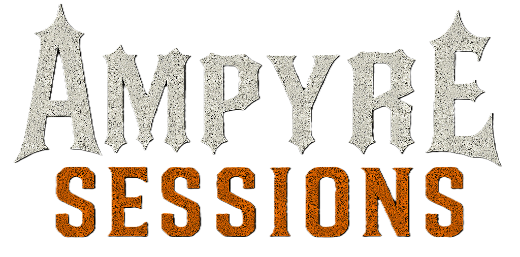 Text reading 'AMY E SESSIONS' with 'AMY E' in gray gothic font and 'SESSIONS' in orange block letters, against a black background.