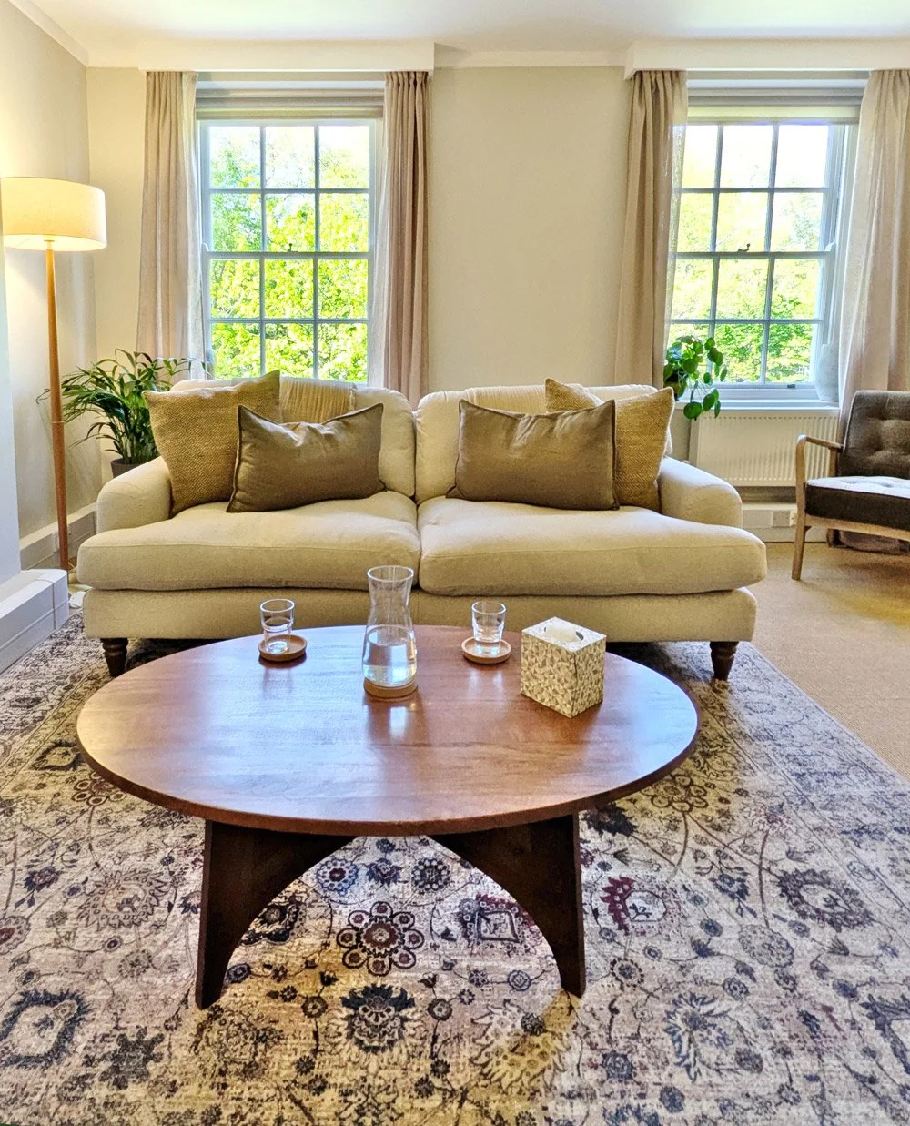 Psychologist treatment room with sofa and table