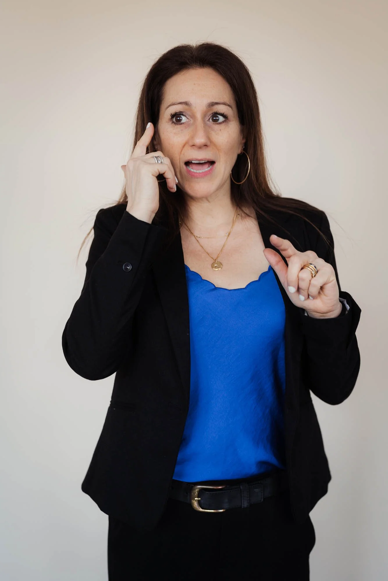 Dr Anna talking to camera wearing blue top