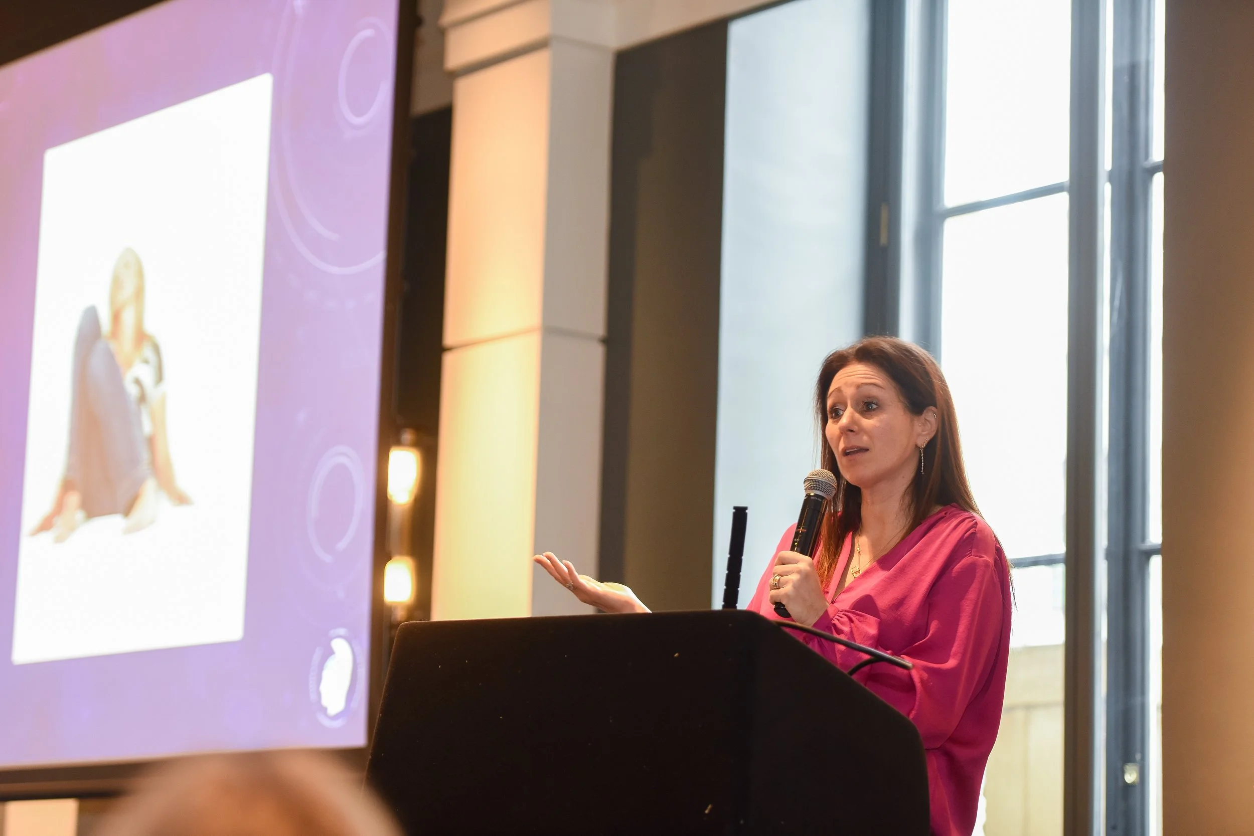 Dr Anna Colton speaking at event