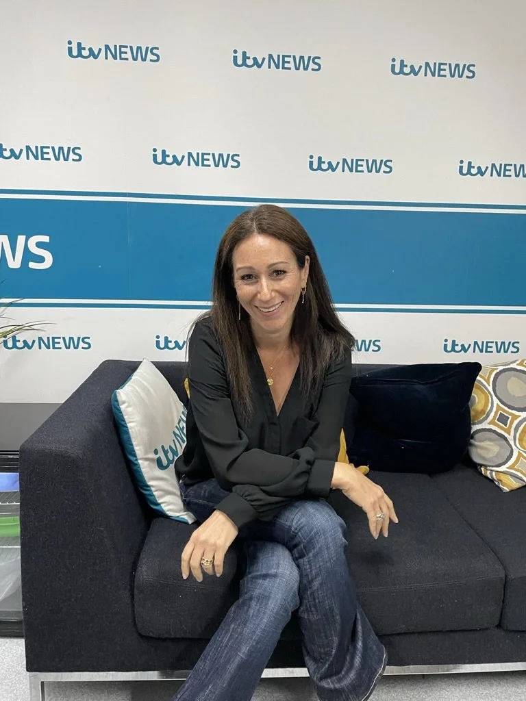 Dr Anna Colton sitting on sofa backstage at ITV News