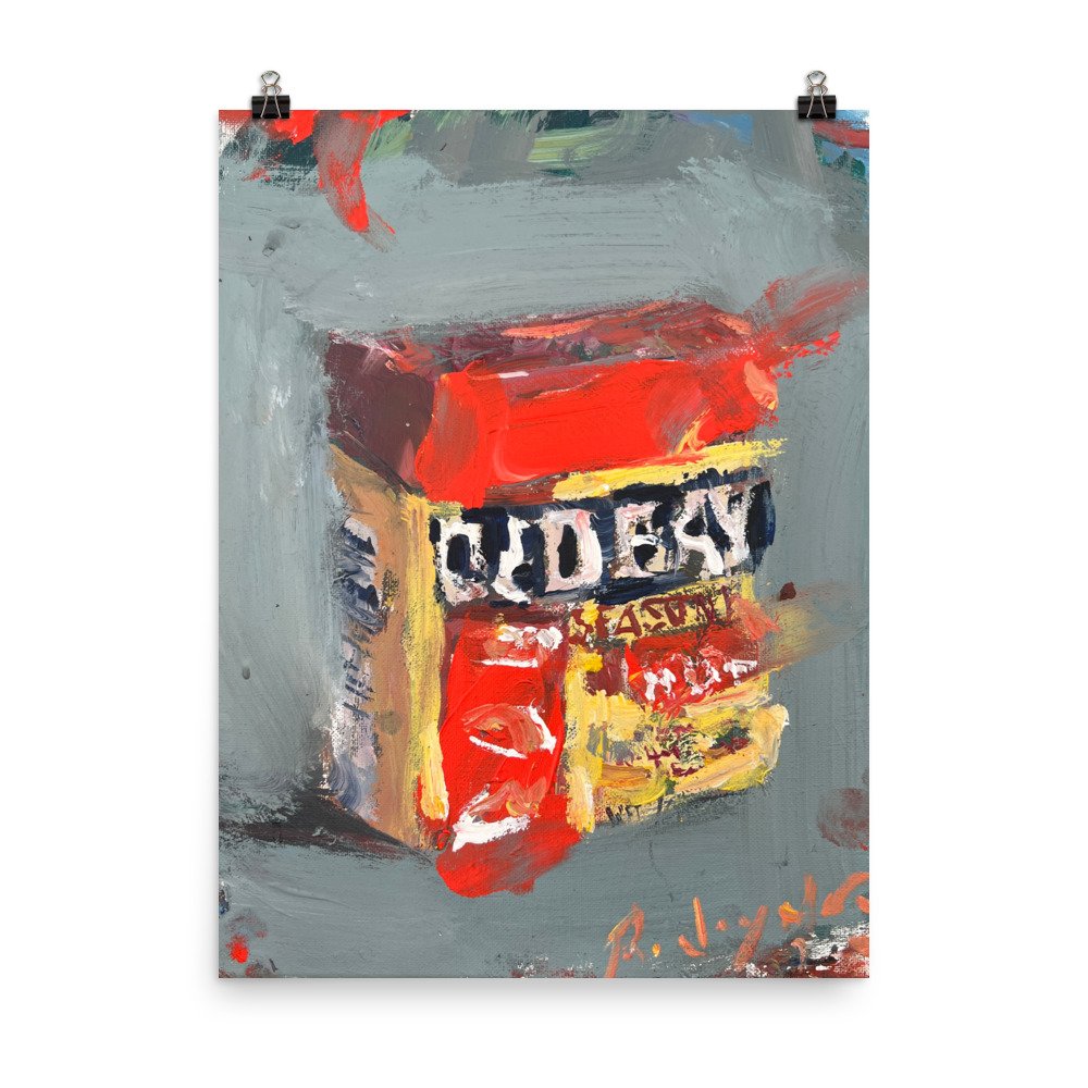 Loose and expressive kitchen decor with Old Bay seasoning hanging from paper clips