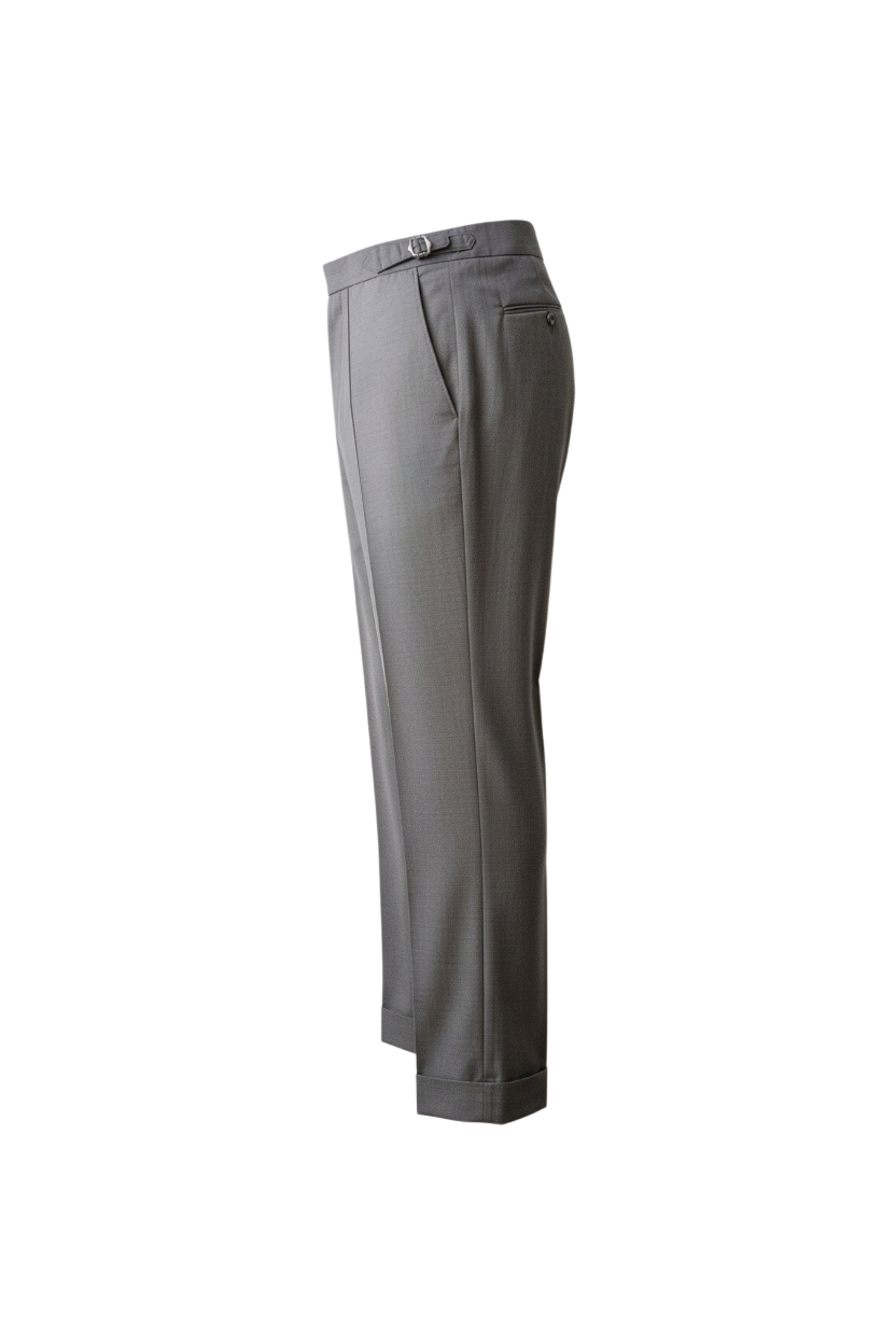 Side view of Malcom's fashionable Bielle model luxury trouser in a light gray worsted wool sharkskin fabric with stitched down crease along the front of both legs and side tab waistband.
