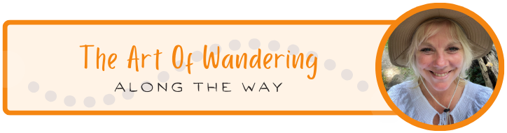 A banner with the text "The Art Of Wandering Along The Way" and a smiling woman wearing a hat in a circular frame on the right side.