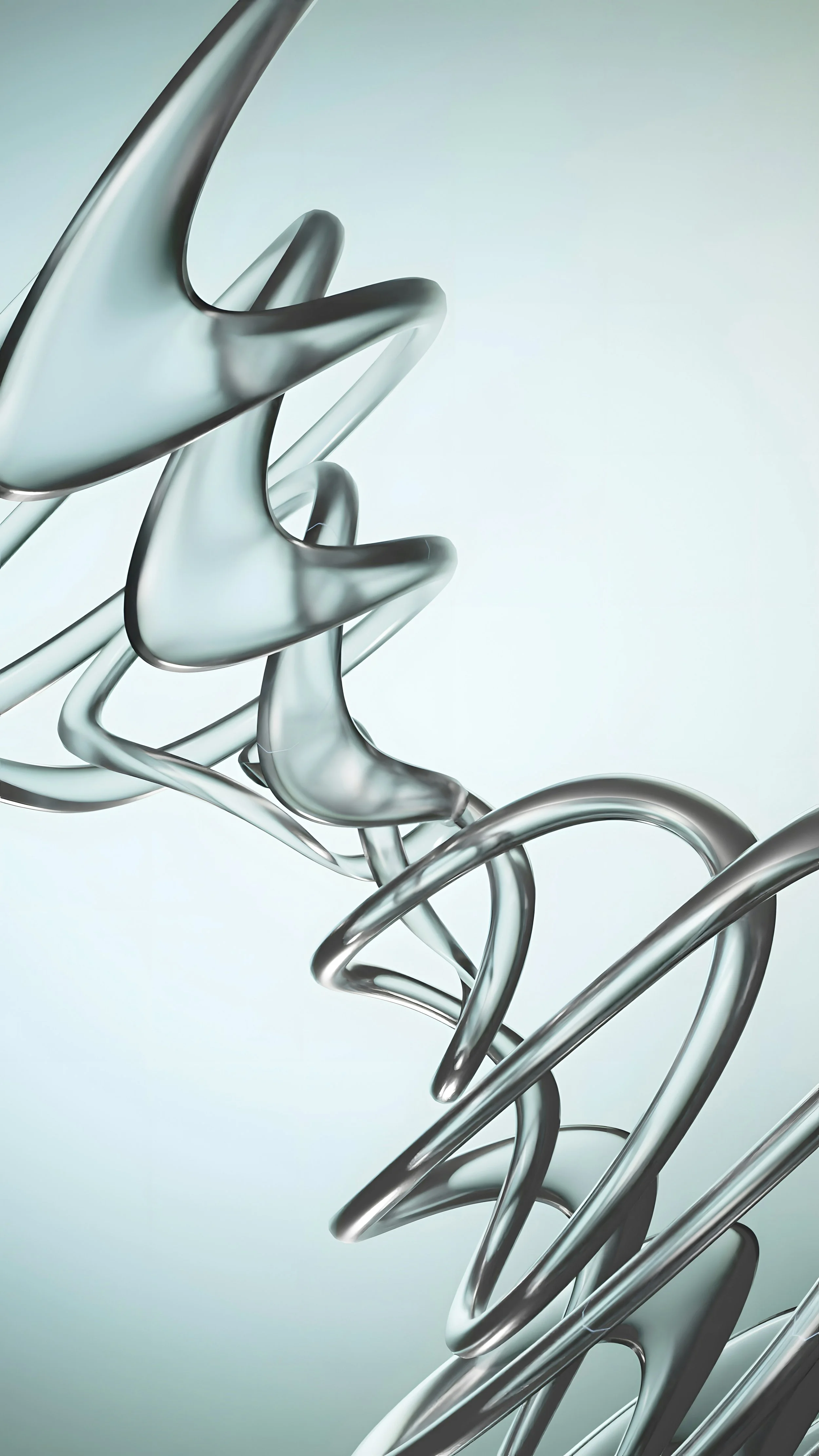 Close-up of intertwined stainless steel abstract sculptures with smooth, reflective surfaces against a pale background.