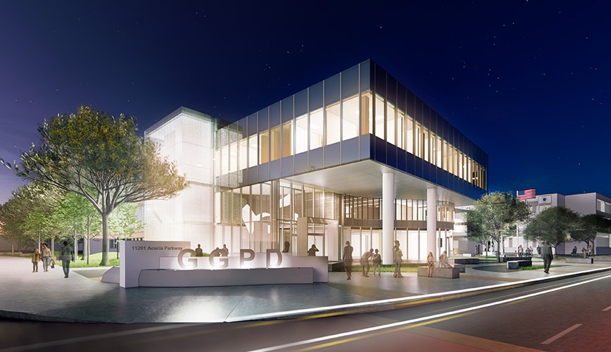 Exterior view of the Superior Court of California building with American flags in front, steps leading up to the entrance, and trees along the sidewalk on a sunny day